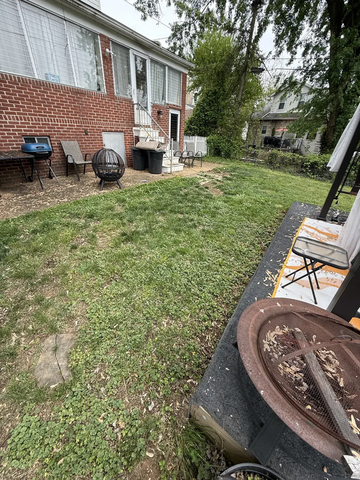 Baltimore outdoor area before the walkway and garden work